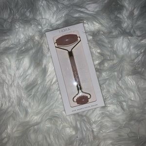 Rose quartz face roller massager